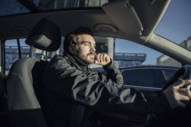 Man driving a car — Stock Photo