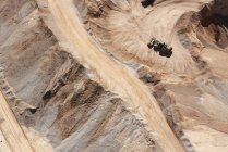 Песок шахты с грейдером движущийся песок — стоковое фото
