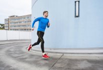 Man running in city — Stock Photo
