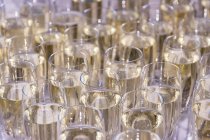 Wineglasses with white champagne — Stock Photo