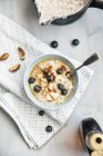 Milk porridge with blueberries and cinnamon — Stock Photo