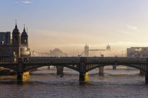 UK, London, Cannon Street Railway Bridge and Tower Bridge in haze — Stock Photo