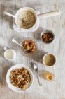 Top view of porridge with rhubarb, coffee, milk and nuts — Stock Photo