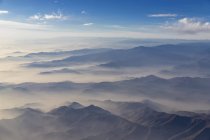South America, Peru, Fog over Cusco region, aerial view of mountain range — Stock Photo