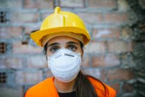 Portrait of working woman with safety mask. — Stock Photo