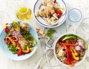 Closeup view of three different salads with vegetables and mushrooms — Stock Photo