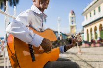 Musician with guitar in the street of Trinidad, Cuba — Stock Photo