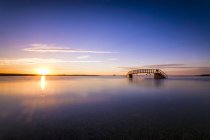 Escócia, East Lothian, Dunbar, submersa Ponte Belhaven ao pôr-do-sol — Fotografia de Stock