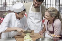 Group of people taking cooking course — Stock Photo