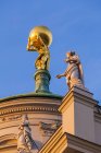 Germany, Potsdam, gold plated Atlas on roof top of old city hall — Stock Photo