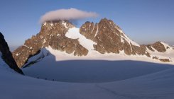 Mountaineers starting from the Bertol Hut — Stock Photo