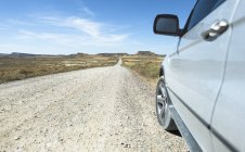 Spain, Logrono, long road and car — Stock Photo