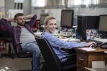 Two creative professionals in office — Stock Photo