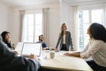 Business people having a team meeting in office — Stock Photo