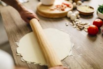 Cropped image of Chef preparing pizza at home — Stock Photo