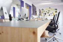 Interior of bright modern office with computers — Stock Photo