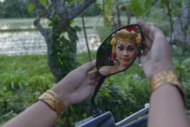 Barong dancer, girl mirrored in mirror — Stock Photo