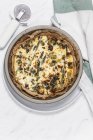 Baking dish of green asparagus tart with feta cheese — Stock Photo