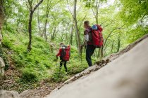 Serbia, Rakovac, young couple hiking with backpacks — Stock Photo