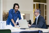 Two businessman working together in office — Stock Photo