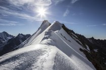 Svizzera, Alpi Pennine, Aletschhorn, alba sulle cime — Foto stock