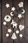 Christmas cookies on wood, cinnamon star, almond cookies, aniseed biscuits — Stock Photo