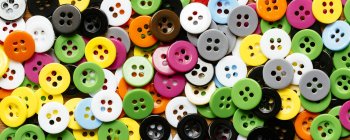 Collection of colourful plastic buttons — Stock Photo