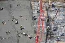 Bauarbeiter bei der Arbeit auf der Baustelle — Stockfoto
