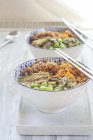 Buddha bowl of Edamame, cucumber, carrots, courgettes, Shirataki noodles and sesame — Stock Photo