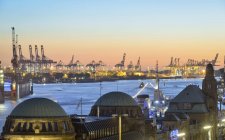 Germany, Hamburg, Port of Hamburg and St. Pauli Landing Stages in the evening — Stock Photo
