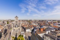 Belgium, Ghent, old town, cityscape with St. Nicholas Church in sunshine day — Stock Photo