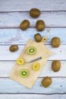 Green and golden kiwis — Stock Photo