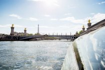 France, Paris, tourboat on Seine River with Pont Alexandre III and the Eiffel Tower in the background — Stock Photo