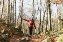Spain, Catalunya, Girona, female hiker walking in the woods — Stock Photo