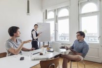 Creative business people having a meeting in a modern office — Stock Photo