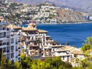 Spain, Andalusia, Grenada, Costa de Tropical, View of La Herradura, houses on coastline — Stock Photo