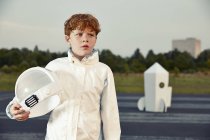 Redheaded boy dressed up as spaceman — Stock Photo