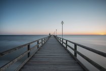 Germany, Mecklenburg-Western Pomerania, Baltic Sea, pier of Zinnowitz at dawn — Stock Photo