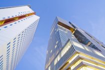 Bottom view of facades of office buildings KPN Tower and De Rotterdam at Kop van Zuid, Rotterdam, Netherlands — Stock Photo
