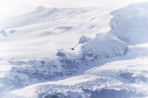 Islande, parc national Vatnajoekull, Jokulsarlon, glacier Breidamerkurjoekull, hélicoptère survolant la neige — Photo de stock