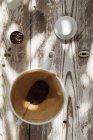 Top view of coffee filter in pitcher on wood — Stock Photo