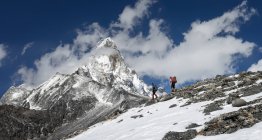 Nepal, Himalaya, Solo Khumbu, Ama Dablam, two men trekking — Stock Photo
