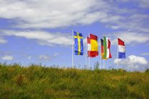 Прапори шести європейських країн дме вітер, Мюнхен, Німеччина — стокове фото
