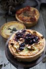 Cranberry cheese tart on wooden spoon — Stock Photo