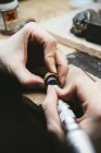 Goldsmith working on wedding rings — Stock Photo