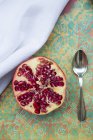 Half of fresh pomegranate — Stock Photo