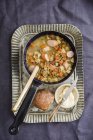 Lentil soup with bockwurst — Stock Photo