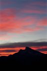 Austria, Upper Austria, Salzkammergut, Mondsee, View to Schafberg, red sky — Stock Photo