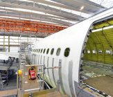 Airplane construction in a hangar indoors — Stock Photo