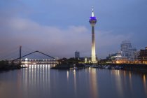 Germany, Duesseldorf, media harbor with Rhine Tower at dusk — Stock Photo